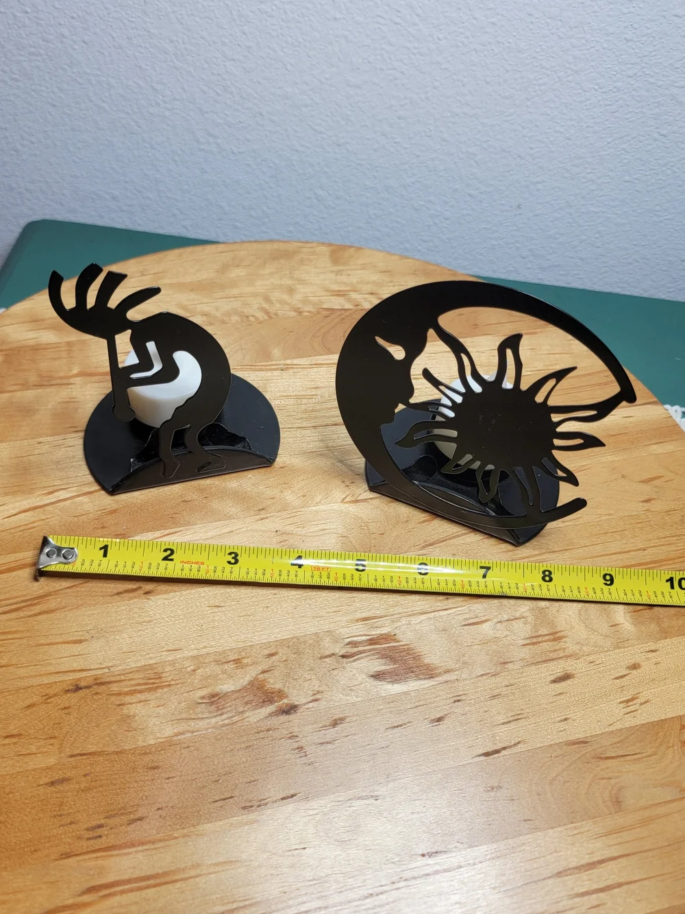 The Southwest Kokopelli Decorative Cast Iron Candle Holders are handmade in the